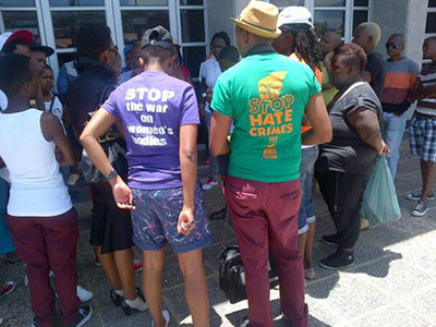 Civil society groups gather outseide the Palm Ridge Magistrates’ Court (Facebook / FEW) 