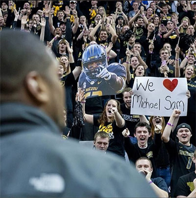 students_block_michael_sam_gay_hate_church_protest_standing_ovation