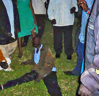 Undated file photo said to show a mob attacking a Ugandan gay man during an earlier incident