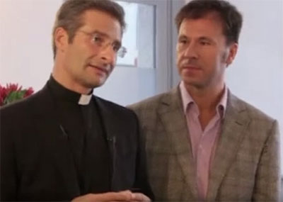 Monsignor Charamsa (left) and his boyfriend (Alessandro Fiorani / YouTube)