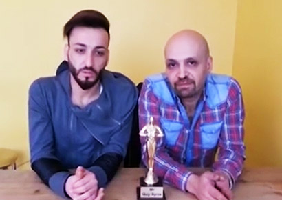 Hussein Sabat (left) with the organiser of Mr Gay Syria
