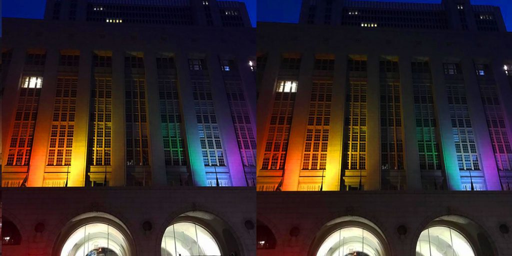 The Western Cape Legislature building illuminated in Pride rainbow colours